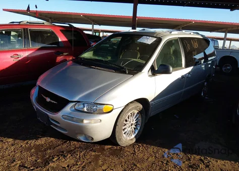 1999 Chrysler Town & Country Limited z USA, uszkodzony, nr VIN 1C4GP64L8XB916537